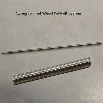 Spring ct tail wheel pull-pull system